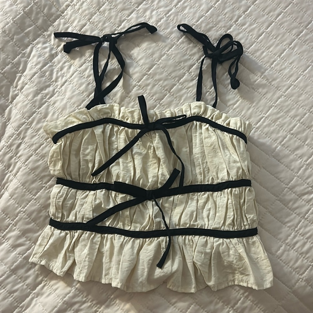 Cute cream and black cropped tank top with bows